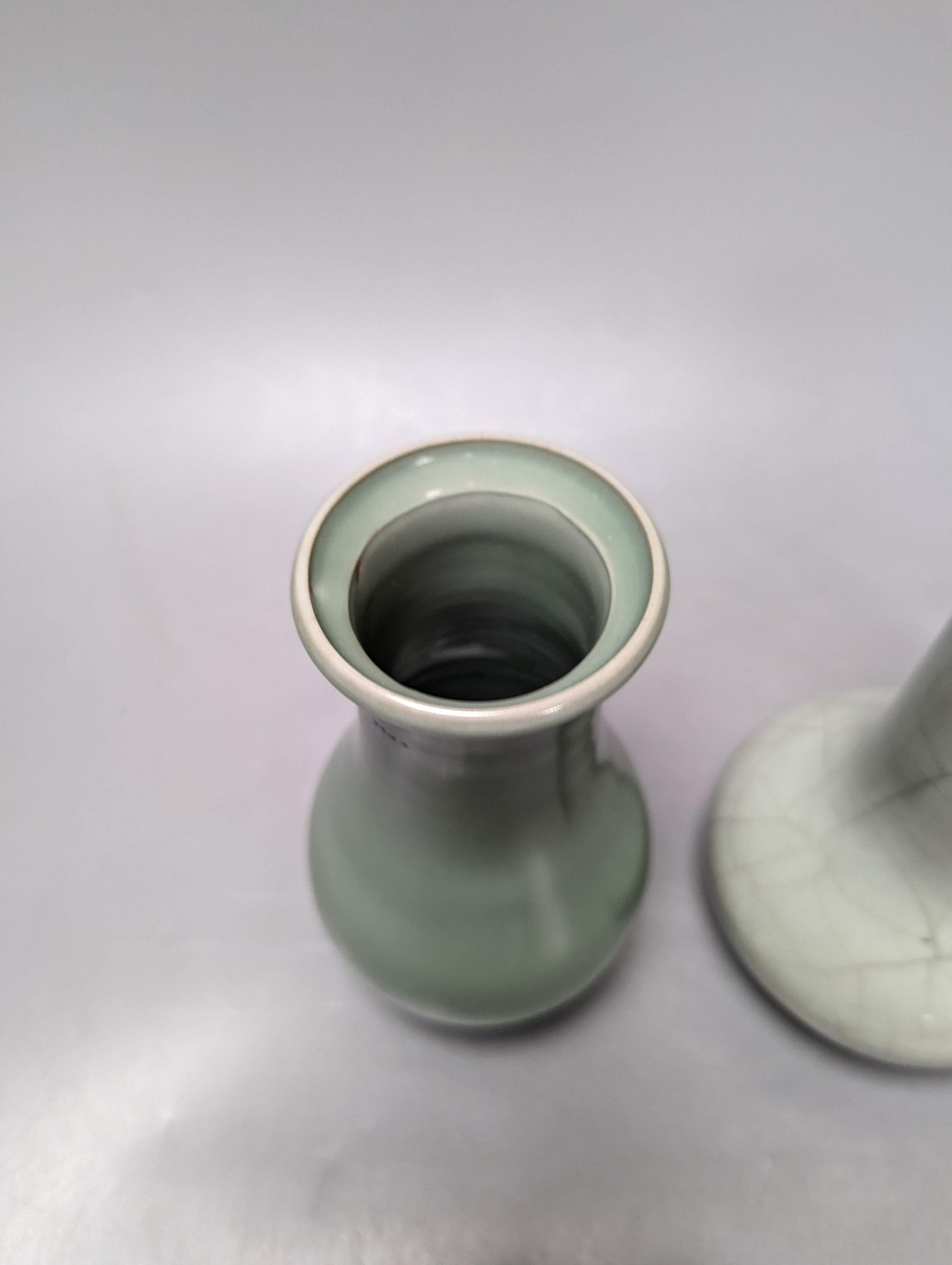 Two Chinese celadon glazed vases, tallest 18 cm